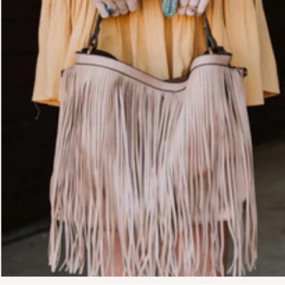 Like new fringe purse from three bird nest